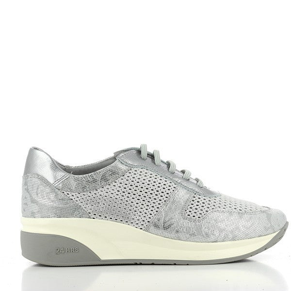 A close-up image of the 24 Hrs 23546 Silver Sneakers, showcasing their sleek leather upper with a reflective silver finish. The sneakers feature a round toe and a durable synthetic sole, offering a stylish and comfortable option for everyday wear. The soft leather lining is visible, highlighting the attention to detail in craftsmanship. Perfectly capturing the essence of modern elegance, these sneakers are a blend of luxury and practicality.