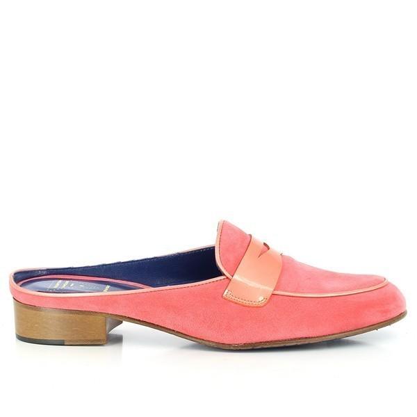 The side view highlights the vibrant coral leather upper and sleek slide-on design. The smooth lines and refined finish emphasize the loafer's sophisticated style.