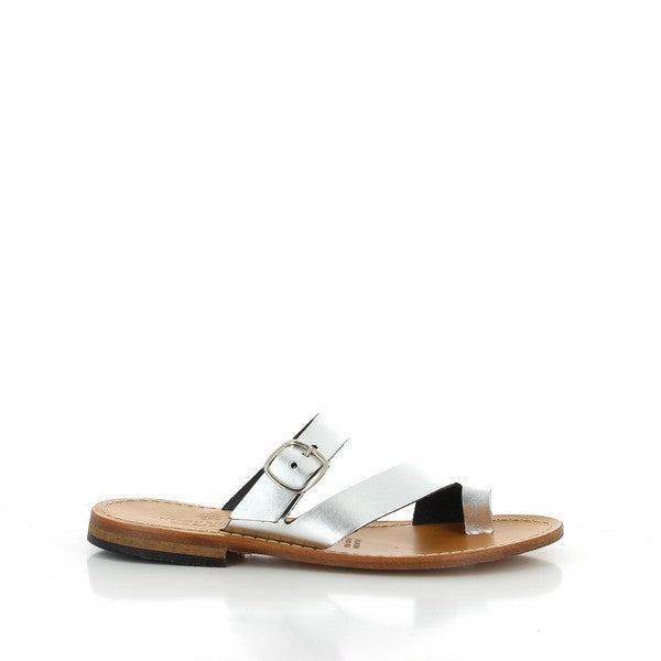 The Antichi Romani 150 Silver Thong Slides are showcased in a minimalist setting, highlighting their sleek silver leather upper. The sandals feature a simple thong design with a 2 cm heel-platform for subtle elevation. The soft leather lining and synthetic sole are visible, emphasizing comfort and durability. Handcrafted in Italy, these sandals exude elegance and quality craftsmanship.