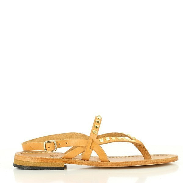 The Antichi Romani 209 Brandy Beige Slingback Thong Sandals are showcased against a neutral background. The sandals feature a soft beige leather upper with elegant gold studs accentuating the straps, adding a touch of sophistication. The round toe and 1cm heel-platform enhance comfort and style. The leather lining and synthetic sole are visible, highlighting the expert Italian craftsmanship. The gold studs create a chic contrast against the neutral leather.