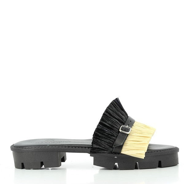 The Antichi Romani 215 Nero Black Fringe Slides are showcased in a sophisticated photo, highlighting their elegant design. The slides feature a sleek black leather upper adorned with stylish fringe detailing that adds a touch of flair. The round toe shape complements the classic aesthetic, while the 3cm synthetic sole provides both comfort and a subtle lift. The rich, textured leather and precise craftsmanship are evident, underscoring the premium quality of these handcrafted Italian sandals.