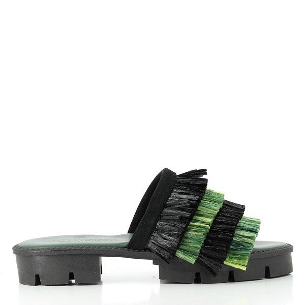 The Antichi Romani 217 Nero Black Fringe Slides are elegantly displayed, showcasing their sophisticated design. The black leather upper is adorned with chic fringe detailing, adding a fashionable touch. The round toe shape complements the classic style, while the 3cm synthetic sole offers both comfort and a subtle lift. The high-quality craftsmanship is evident in the rich texture and precise construction of these Italian-made women's shoes.