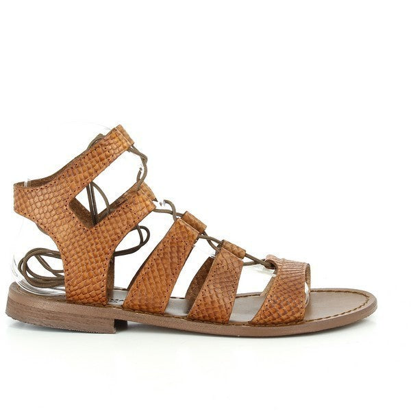 The image features the Antichi Romani 348 Light Brown Gladiator Sandals from a three-quarter angle, highlighting their stylish and contemporary design. The light brown leather showcases a rich texture, complementing the elegant multiple straps that gracefully wrap around the foot. The classic round toe shape is visible, enhancing the sandals' timeless appeal. The craftsmanship is evident in the meticulous stitching and clean lines, which reflect the brand's dedication to quality and artisanship.