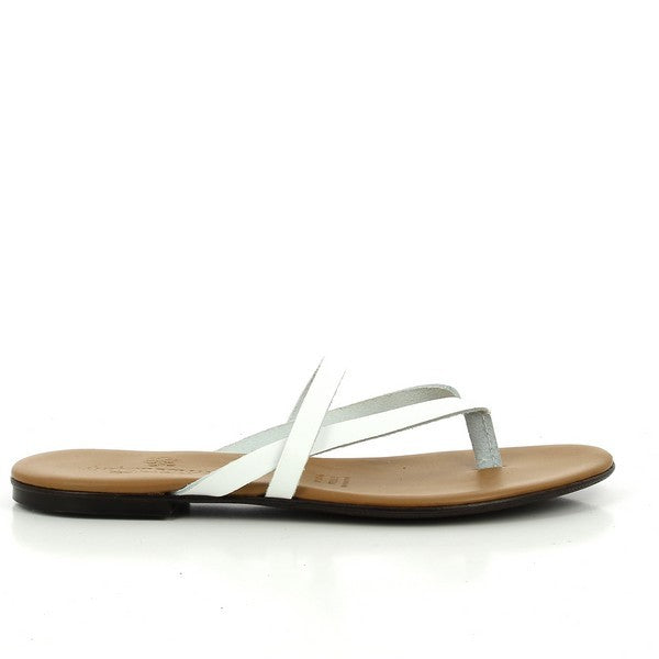 The Antichi Romani 541 White Thong Slides are elegantly presented on a soft, neutral surface, highlighting their sleek and minimalist design. The upper features smooth white leather with a subtle sheen, showcasing the exquisite craftsmanship of the Italian brand. The thong style is complemented by a rounded toe, and the 1cm platform heel offers a slight lift for added comfort. The soft leather lining is visible, hinting at the luxurious feel within.