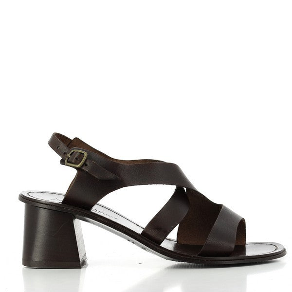 The Antichi Romani 818 Dark Brown Slingback Heels are elegantly displayed from the side, showcasing their sophisticated design. The smooth leather upper is highlighted by a rich dark brown color, complemented by a subtle sheen. The rounded toe shape enhances the classic appeal, while the 5cm heel adds a touch of elegance. The slingback strap is adjustable, ensuring a secure fit. The leather lining can be seen peeking from the inside, emphasizing comfort.