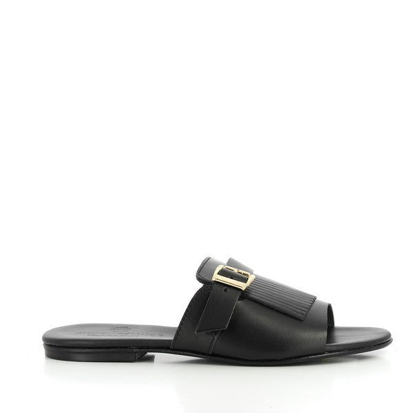 The Antichi Romani 845 Nero Black Fringe Slides are beautifully showcased, featuring a sleek black leather upper with chic fringe detailing across the front. The smooth leather lining is visible, ensuring comfort, while the 1cm heel-platform offers subtle elevation. The side view highlights the rounded toe and minimalist design, emphasizing the luxurious leather craftsmanship. The durable synthetic sole is subtly visible, making these slides both stylish and practical for daily wear.