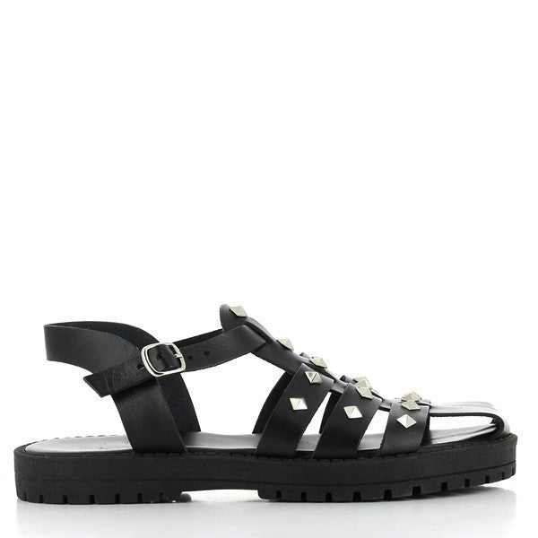 The Antichi Romani 891 Nero Black Cage Sandals exude sophistication and craftsmanship. Made from premium black leather, these sandals feature a stylish cage design with elegantly woven straps that offer both support and style. The soft leather lining ensures comfort, while the round toe shape enhances their classic appeal. Set on a durable synthetic sole, these sandals provide stability and flexibility with each step.