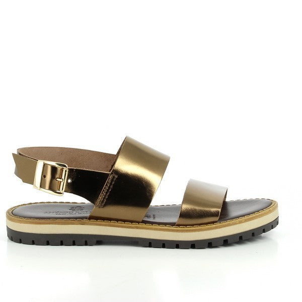 The Antichi Romani 899 Bronze Slingback Sandals showcase a sleek bronze leather upper with a radiant metallic finish. The design features a round toe and an adjustable slingback strap for a secure fit. A 2cm heel-platform adds subtle elevation, while the synthetic sole and leather lining provide comfort and durability. These sandals, handcrafted in Italy, offer a blend of artisanal quality and modern elegance, perfect for versatile styling.