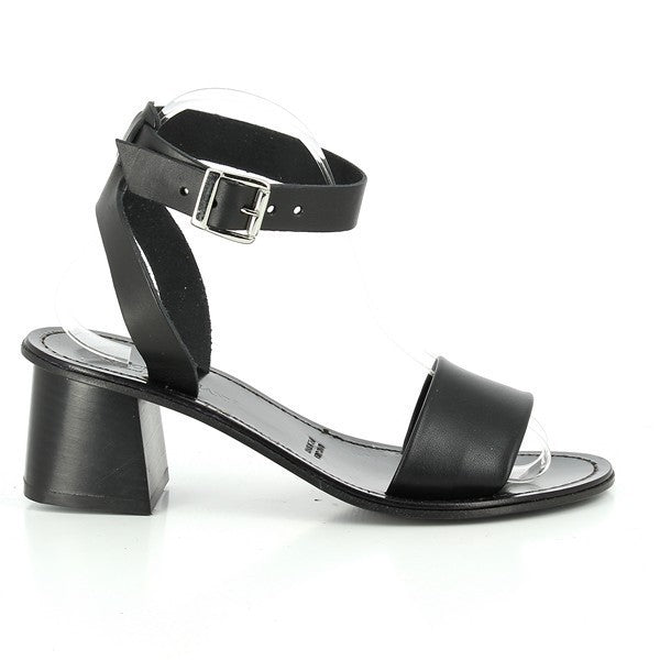 The Antichi Romani 940 Black Slingback Heels are elegantly displayed against a soft, neutral background, highlighting their refined and chic design. Crafted from smooth black leather, the upper showcases a sleek finish, emphasizing the meticulous craftsmanship of the Antichi Romani brand.