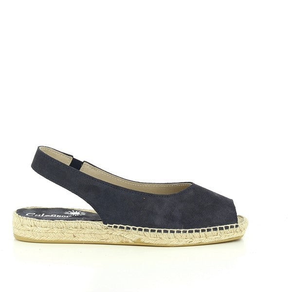 A pair of Calzanor 2219 Navy Slingback Espadrilles elegantly positioned on a soft, neutral background. The shoes showcase a sleek navy leather upper with a stylish slingback strap and a round toe, exuding sophistication and versatility. The jute-wrapped sole, accented by a subtle 2.5cm platform heel, adds a natural texture, highlighting their handcrafted quality. The overall aesthetic is chic and modern, making these espadrilles an ideal choice for both casual outings and more polished summer looks.
