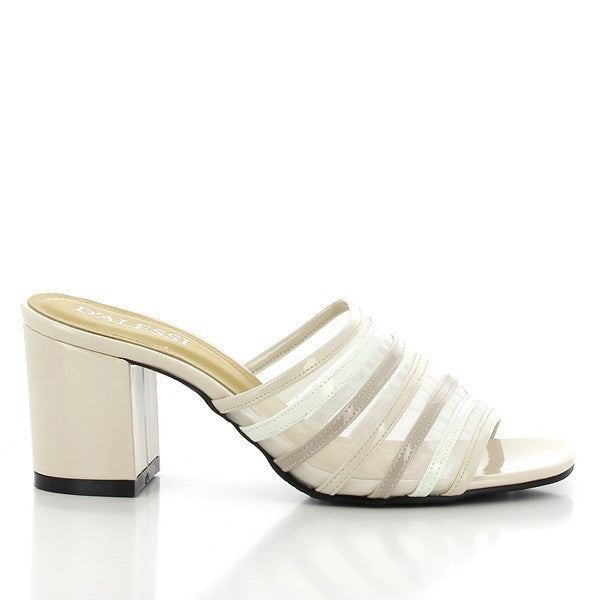 The side profile of the Dalessi Dante Beige Slides showcases a smooth synthetic upper that curves gracefully into the 8 cm heel, offering a sleek and modern silhouette.