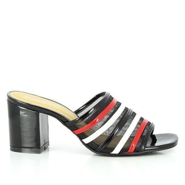 The side profile of the Dalessi Dante Black Slides features a sleek, smooth synthetic upper that leads into a sturdy 8 cm heel, creating a clean and modern silhouette.