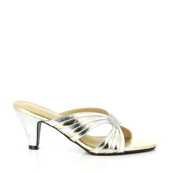 The side profile of the Dalessi Daylight Gold Slides shows a smooth synthetic upper with a subtle gold metallic sheen. The 7 cm heel adds a refined lift to the elegant design.