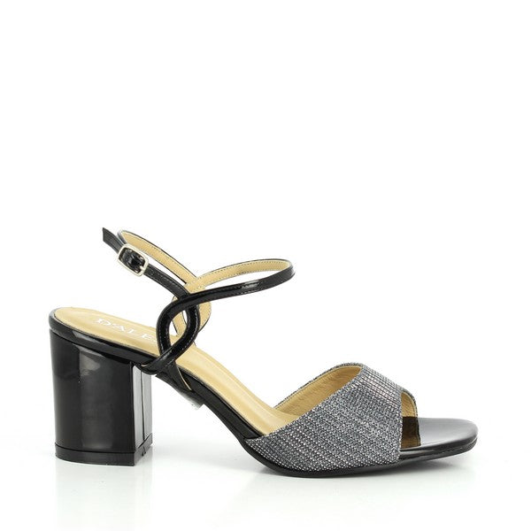The side view of the Dalessi Distinct Black & Pewter Slingback Sandals showcases the sleek synthetic upper with a striking black and pewter contrast. The open design and 7 cm heel-platform create an elegant and modern silhouette.