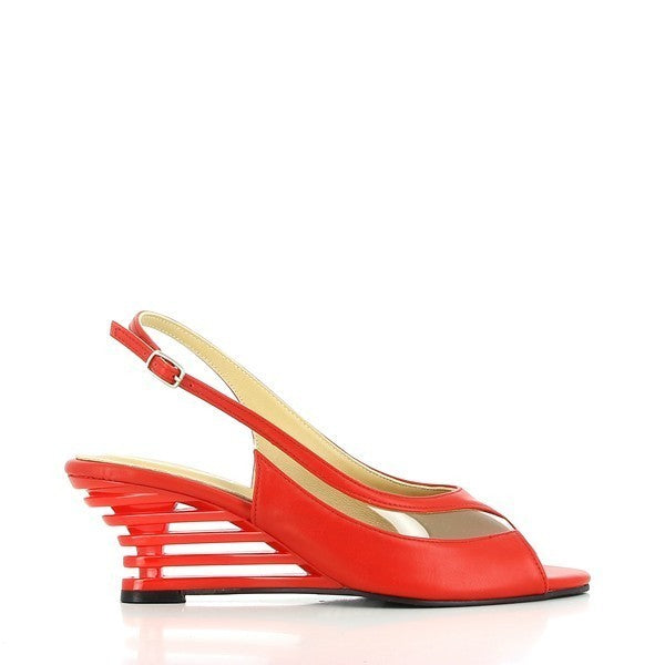 A sleek side profile highlighting the bold red leather upper and the elegant slingback strap. The clean lines and 7 cm heel-platform offer a modern, sophisticated look.