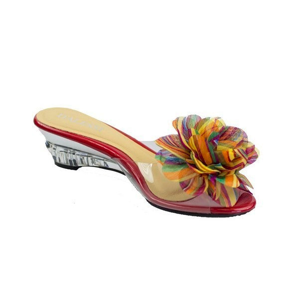 A side profile of the Dalessi Dreama Red Slides showcasing the vibrant red transparent upper with multicolour flower decor. The 5cm platform heel is visible, with its clean lines and a smooth synthetic sole adding an elegant touch.