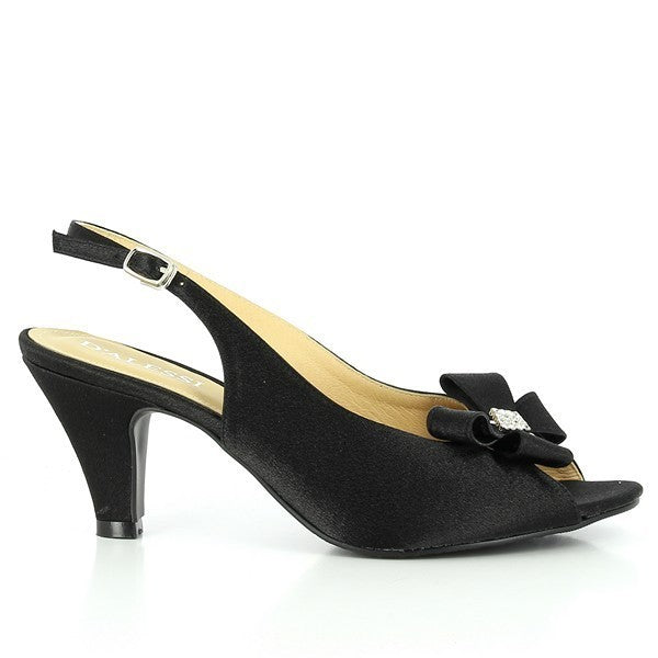 A side view of the Dalessi Duedrop Black Slingback Heels, showcasing the sleek synthetic upper, elegant front bow detail, and the 8 cm heel for a flattering lift.