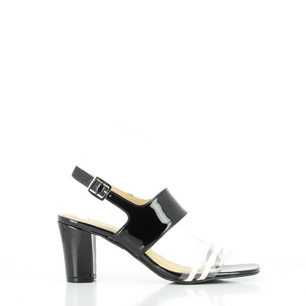 The sleek and stylish design showcases the contrasting black and white straps, highlighting the clean lines and rounded toe shape. The 7.5 cm heel adds a touch of elegance while maintaining comfort.