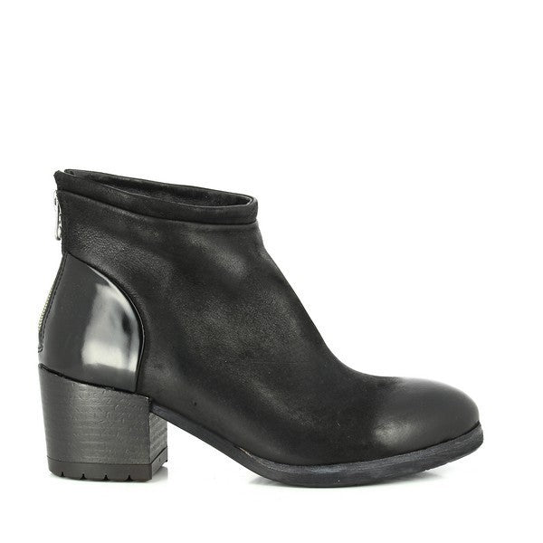 A close-up shot of the Felmini 9848 Grey Ankle Boots showcasing the sleek leather upper, with the stud detailing along the side for added style. The rounded toe and low heel provide a perfect blend of elegance and comfort.