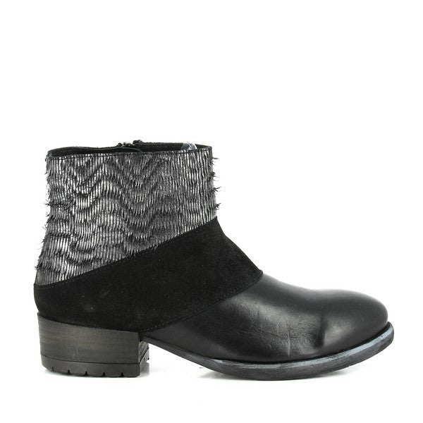 A sleek profile of the Felmini 9907 Black & Silver Ankle Boots showcasing the smooth black leather upper with silver fringe detailing, creating a modern, bold look.