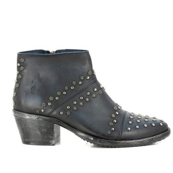 A navy ankle boot with a sleek leather upper featuring decorative metallic studs along the outer side. The external zipper adds a stylish and practical detail, while the 5.5cm heel and rounded toe showcase a balanced mix of elegance and comfort.
