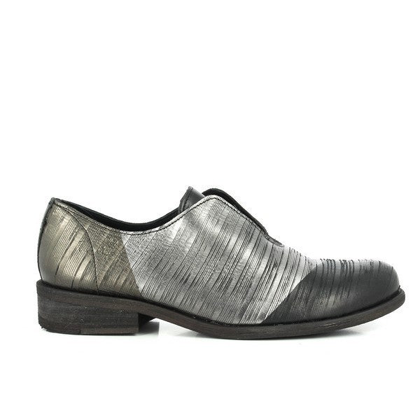 A sleek, side profile of the Felmini A441 Grey Slide-On Shoes, showcasing the smooth, natural leather upper with its clean lines and elegant, minimalistic design. The rounded toe adds a timeless touch, while the 3cm heel offers a subtle lift for added sophistication.