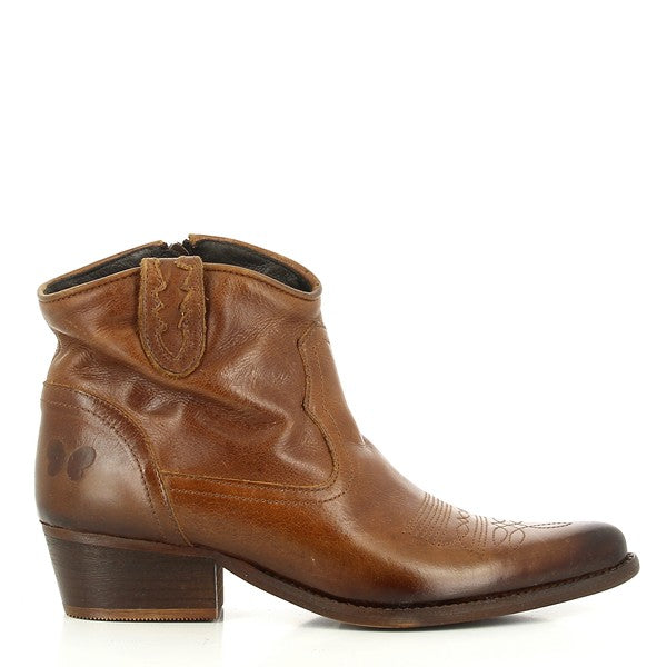 A detailed view of the Felmini B504 Light Brown Ankle Boot's side, showcasing its smooth leather upper, pointy toe, and sleek silhouette. The 4 cm heel adds subtle height, while the clean lines highlight its modern design.