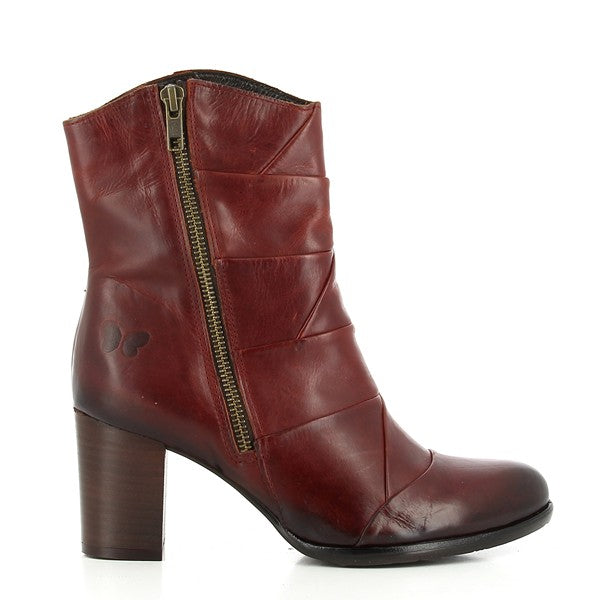 The Felmini C014 Burgundy Boots showcase a sleek, mid-calf silhouette, with a rich burgundy leather upper. The rounded toe and clean lines emphasize a timeless, elegant look.