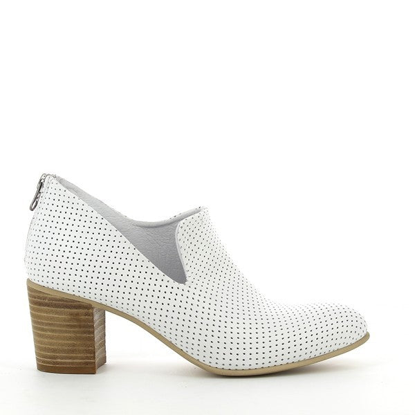 A sleek and minimalist profile showcasing the smooth white leather upper, with clean stitching details and a classic round toe shape. The back zipper is subtly visible, adding a modern touch to the boot's silhouette.