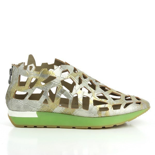 The Forte S15-6100 Silver Sneakers showcase a sleek metallic leather upper with a modern laser-cut design that adds texture and sophistication. The smooth synthetic sole contrasts subtly with the silver leather, giving the shoe a clean, contemporary look. The pointed toe shape contributes to the stylish, streamlined profile.