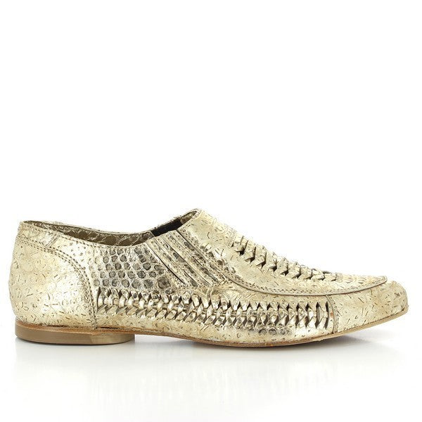 A sleek profile of the shoe showcasing the shimmering gold snake-print leather with folded detailing. The braided leather accent runs seamlessly along the top, highlighting the shoe's intricate craftsmanship.