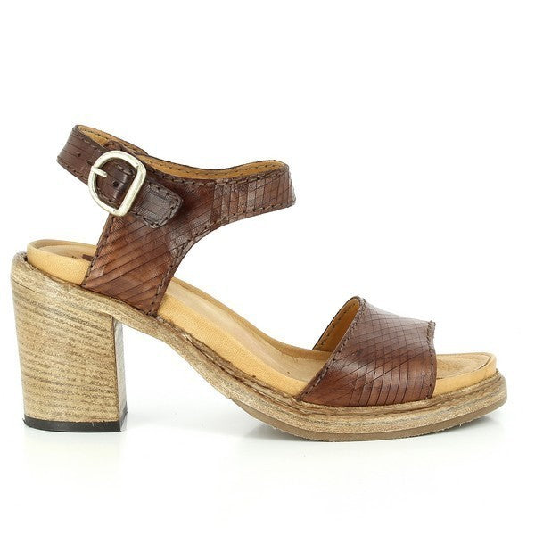 The photo showcases the side view of the Forte S17-4440 Brown Slingback Sandals, emphasizing the sleek leather upper, smooth lines, and adjustable slingback strap with a buckle. The round toe adds to its classic silhouette.