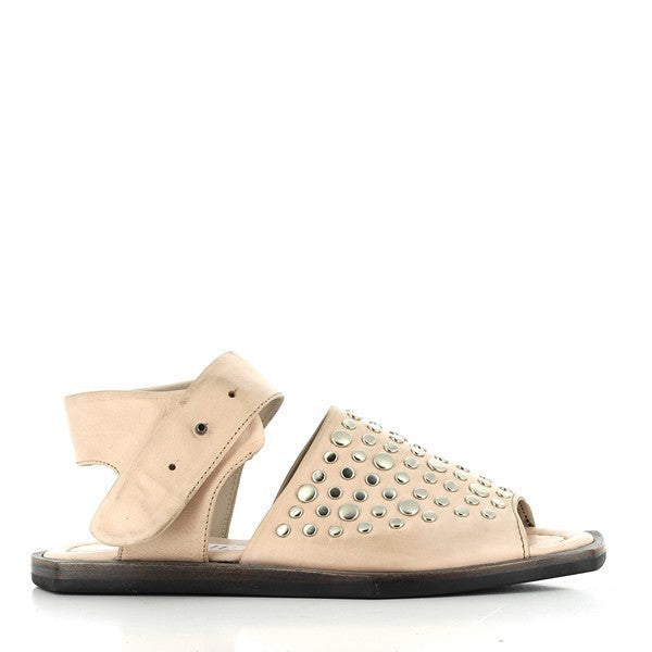 The side of the Forte S184300 Nude Slingback Sandals, showcasing the sleek leather upper with elegant silver studs along the strap, giving the sandal a sophisticated finish.