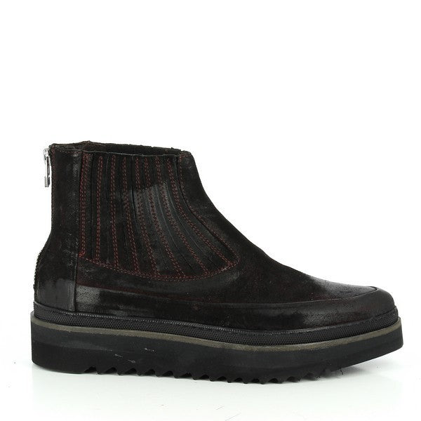 A close-up of the Forte W167224 Burgundy Ankle Boot, showcasing the smooth leather upper with a rich burgundy color and a rounded toe. The sleek, streamlined silhouette offers a modern yet classic look.