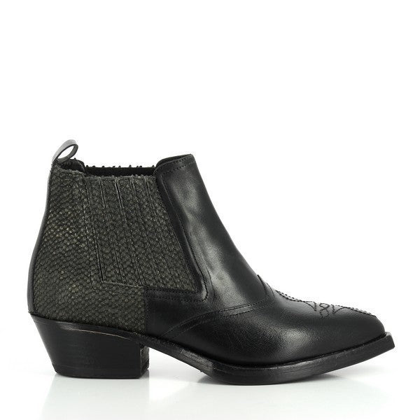 The side profile of the black ankle boot showcases its sleek leather upper, subtle shine, and elastic side panel for easy slip-on wear. The 4cm platform heel adds a touch of height and elegance.