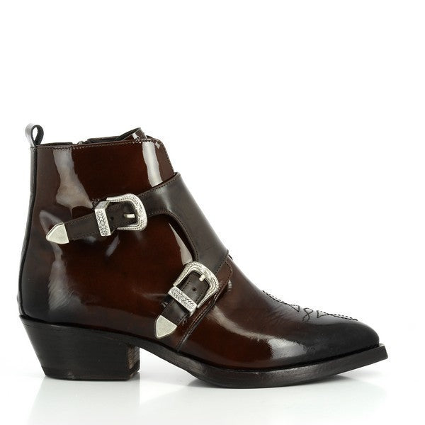 A side profile of the brown ankle boot showcasing its sleek double monk strap design with two polished buckles, a smooth leather finish, and the sturdy 4cm heel.