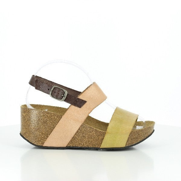 A side view of the Plakton 275028 Yellow & Tan Wedges showcasing the sleek leather upper, double straps, and adjustable ankle buckle. The contoured cork sole adds a natural touch, elevating the design.