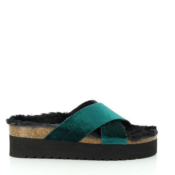 Step into sustainable style with Plakton's 281051 Turquoise Cross-Strap Fur Platform Sandals. Handcrafted in Spain, these sandals feature a turquoise synthetic upper, leather lining, and a cork sole with black fur detail. Adjustable buckles ensure a perfect fit, while the 5cm heel-platform height adds subtle elevation. Discover more at Plakton.