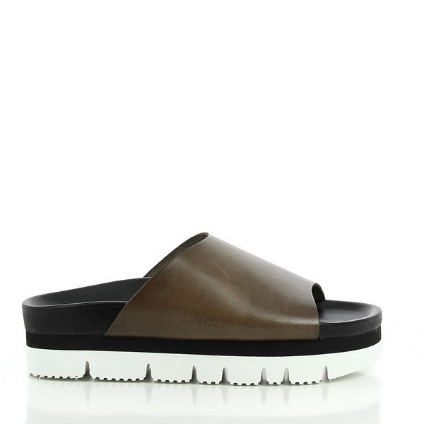 A stylish image showcasing Plakton's 443036 Khaki Platforms. These women's sandals feature a khaki leather upper, a 5 cm platform heel, and a synthetic sole. The elegant design includes a round toe shape and an adjustable strap, offering both comfort and sophistication. Perfect for eco-conscious fashionistas.