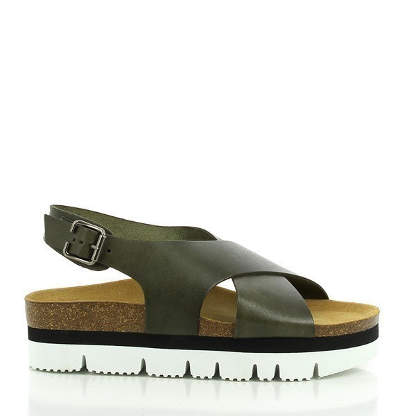 A chic photo showcasing Plakton's 465166 Khaki Cross-Strap Platforms. These women's sandals feature stylish khaki leather cross-straps, a 5 cm platform heel, and a synthetic sole with a cork base. The design includes a round toe shape and an adjustable slingback strap with a buckle for a secure fit. Perfect for modern, eco-conscious fashionistas.