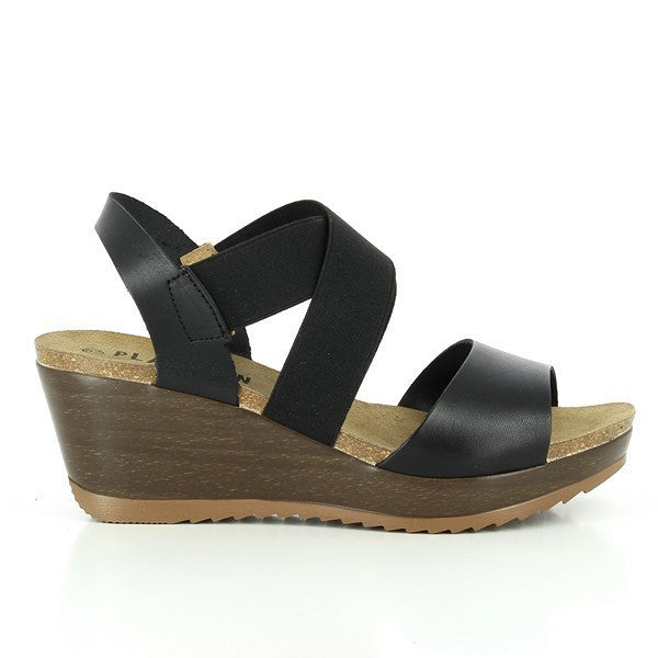 Elevate your style with Plakton's 525286 Black Cross-Strap Wedges. Handcrafted in Spain from premium leather and featuring a 5 cm cork sole, these sandals blend chic design with comfort for all-day wear. Ideal for any occasion, from casual outings to sophisticated evenings.