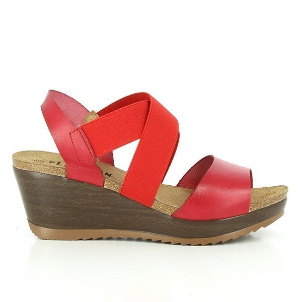 Experience sophistication with Plakton's 525286 Red Cross-Strap Wedges. Handcrafted in Spain from premium leather and featuring a 5 cm cork sole, these sandals effortlessly blend style with comfort. Perfect for elevating your look from day to night with ease.