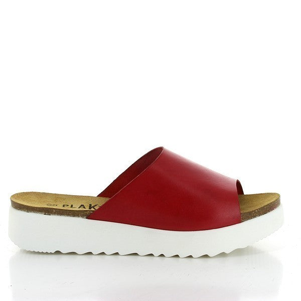 Step into style and comfort with the Plakton 665168 Red Wedges. Crafted from fine leather with a cork insole and a sleek synthetic sole, these women's sandals elevate your look with a 1.5-3 cm platform heel. Made in Spain for quality you can trust.