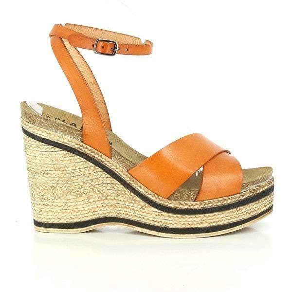 Step into bold elegance with Plakton's 783103 Orange Slingback Espadrille Wedges. Featuring high-quality leather cross straps and an ankle strap with a small buckle, these women's wedges ensure a secure fit. The 2-9 cm wedge platform adds height and comfort. Crafted in Spain for exceptional quality.