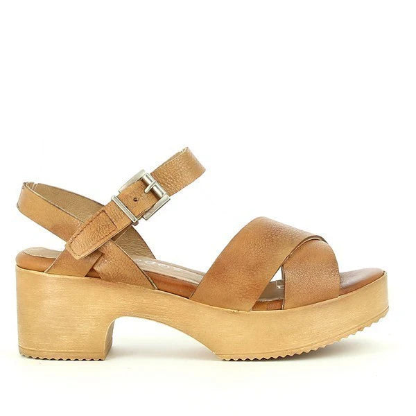 A full side view of the Igualados 2216 Tan Slingback Sandals, showcasing the elegant leather cross straps and round toe design, with a 6cm heel for a stylish lift.