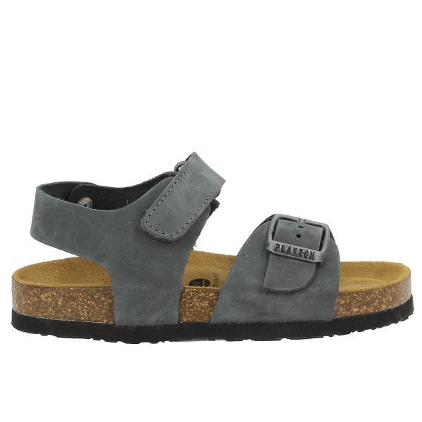 The photo showcases Plakton's 125477 Grey Slingback Kids Sandals. Expertly crafted in Spain, these sandals feature high-quality grey leather uppers, a breathable leather lining, and a natural cork sole. The design includes an adjustable buckle-fastening strap and a velcro ankle strap for a secure fit, with a comfortable 2cm heel-platform and round toe shape.