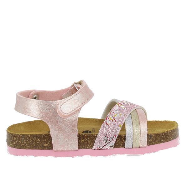 The photo showcases Plakton's 135284 Metallic Pink Kids Sandal, highlighting its stylish metallic pink color and delicate floral motifs. The adjustable velcro ankle strap ensures a secure fit, while the eco-conscious cork footbed promises comfort and support. Made in Spain, this sandal embodies craftsmanship and quality, perfect for every little adventure.