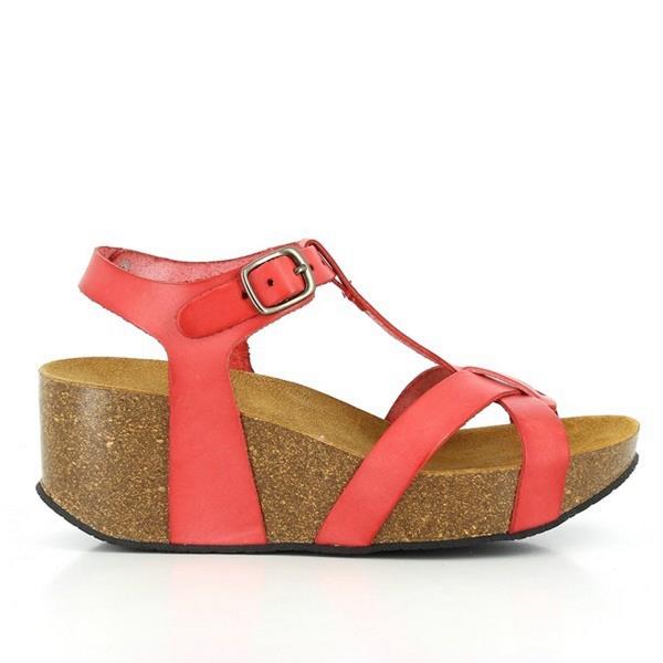 A close-up view showcasing the side profile of Plakton's 273015 Coral Wedges. The vibrant coral leather upper contrasts elegantly with the natural cork sole. The unique cross-band design and adjustable buckle strap are prominently displayed, highlighting both style and functionality.