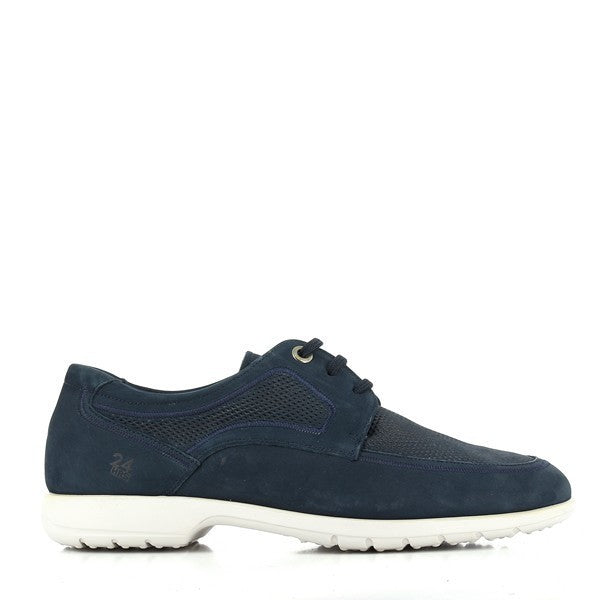 A close-up of the 24 Hrs 10332 Navy Lace Up Sneakers, showcasing the rich navy leather upper with a textured finish. The round toe shape and neatly stitched seams highlight the premium craftsmanship. The image captures the sleek design, including the durable synthetic sole and the elegant lace-up closure, against a clean, neutral background.