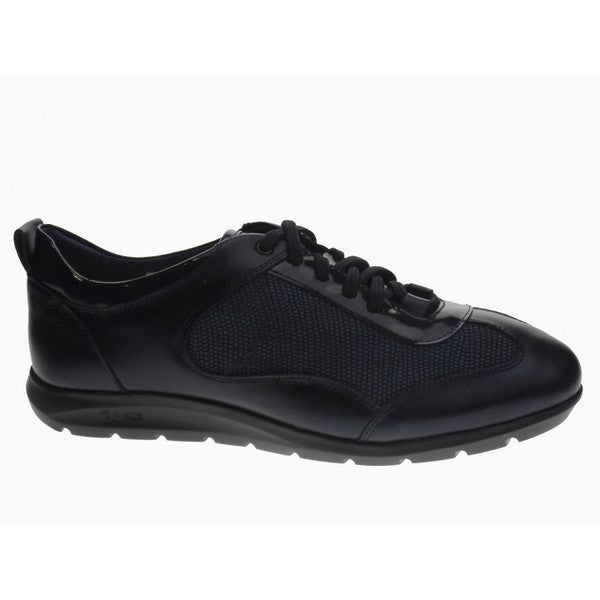 A pair of 24 Hrs 22351 Black Sneakers, featuring a sleek black leather upper. The shoes have a classic round toe, soft leather lining, and a durable synthetic sole with a 2 cm heel-platform height. Displayed against a neutral background, they highlight their modern design and superior craftsmanship.